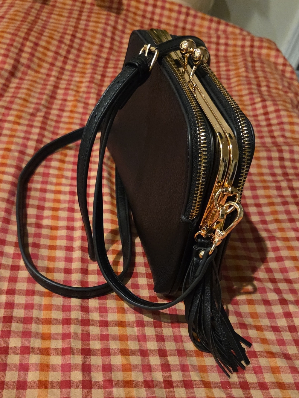 Black Crossbody Bag with Gold Hardware and Tassel